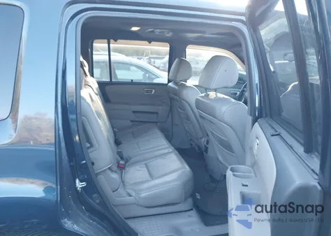 2011 Honda Pilot Touring z USA, uszkodzony, nr VIN 5FNYF3H91BB006657